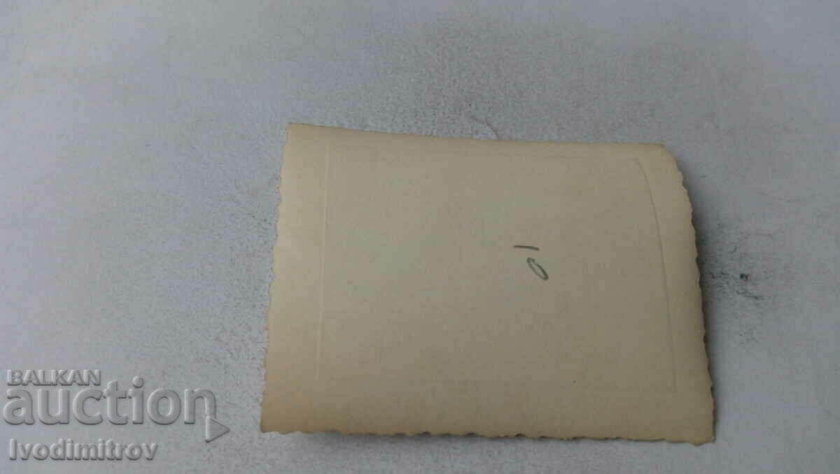 Photo A young man and four girls in front of a lake in the park with price 1.35 BGN | € 0.69