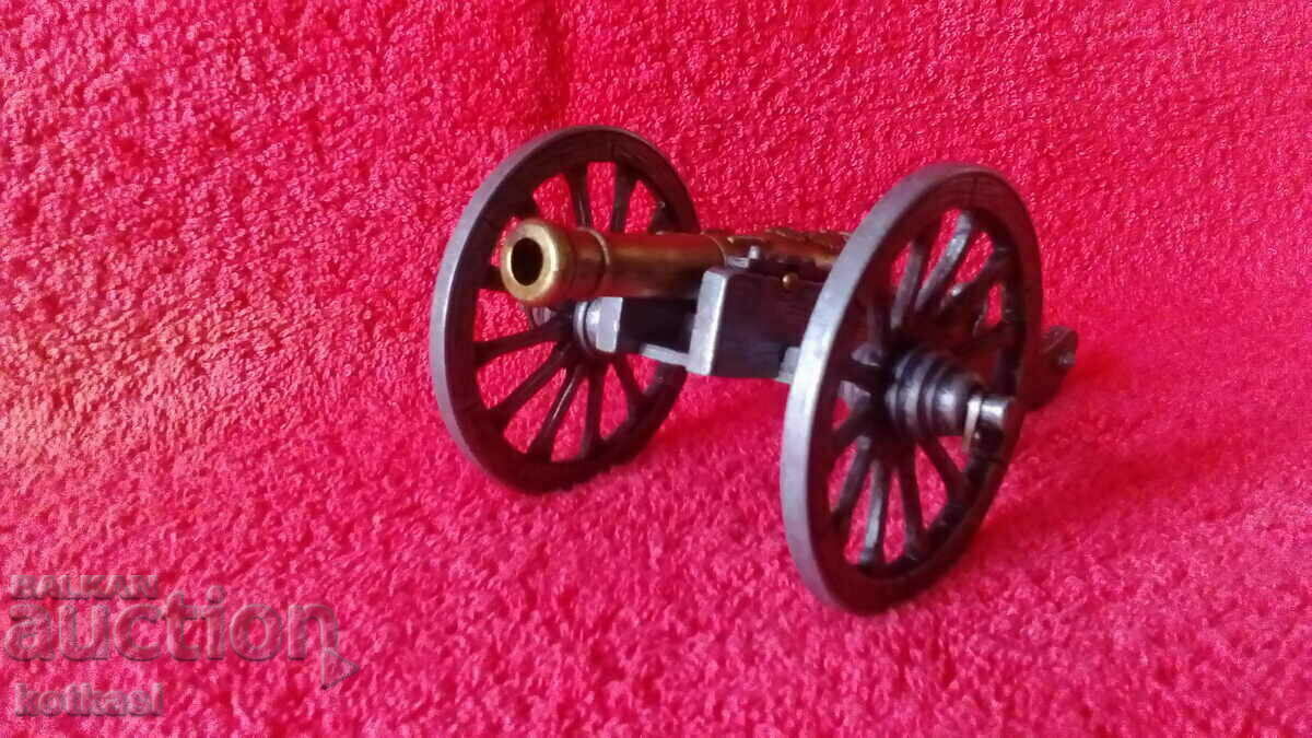 Old metal figure cannon Top Artillery
