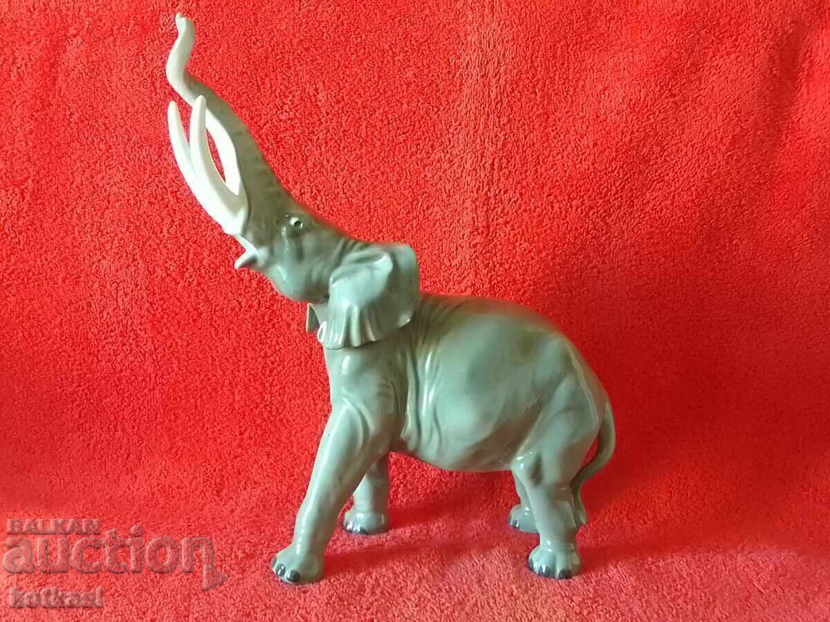 Auction  Old porcelain figure of an Elephant, origin Germany