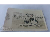 Photo Mar del Plata Man and woman in retro swimsuits on the beach 1942