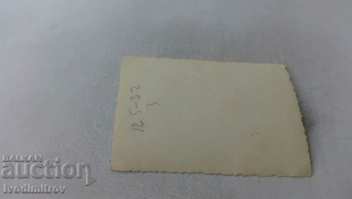 Photo Sofia Three men on the sidewalk with price 2.65 BGN | € 1.35