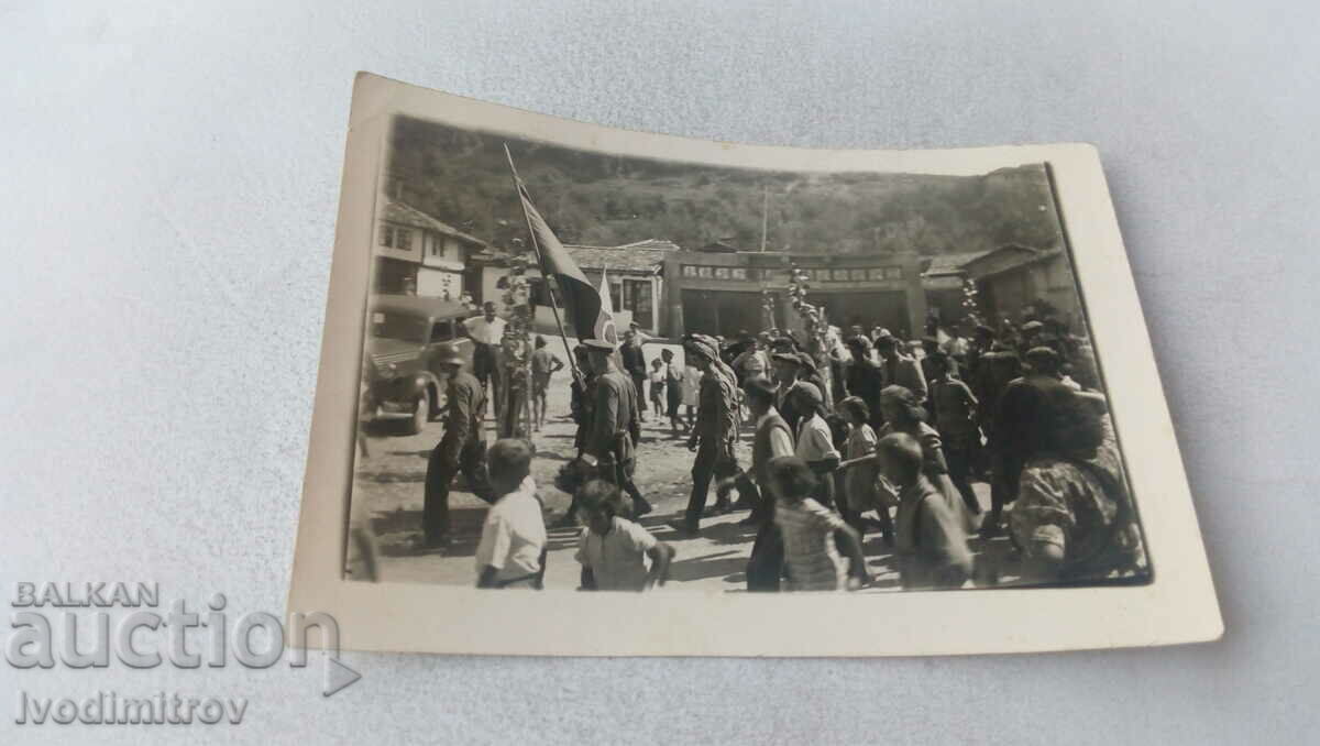 Photo Military and civilians on parade in the square