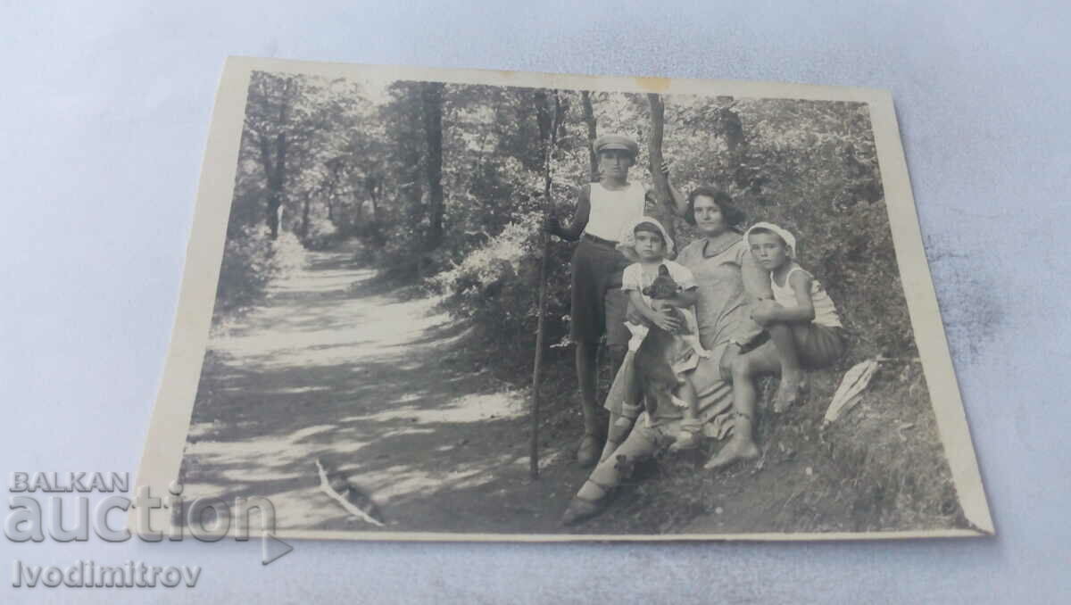 Photo Dupnitsa Woman three children and a dog in the forest 1932