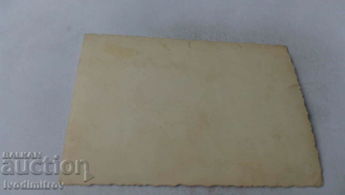 Photo Man and three women in winter coats with price 1.45 BGN | € 0.74