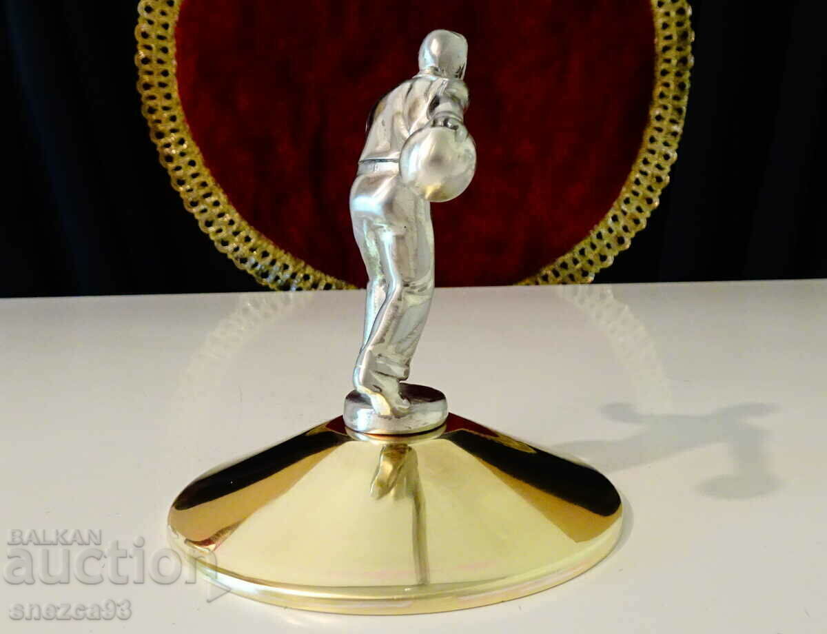Delivery of Statuette, bowling figure made of pewter, bronze