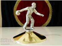 Bowling figurine made of tin, brass.