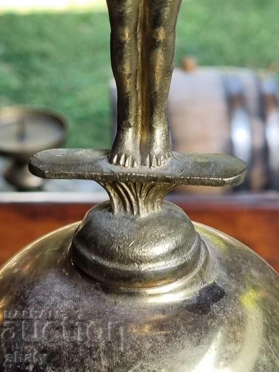 Delivery of Old bronze bowl. Bronze statue Delivery of Old bronze bowl. Bronze statue