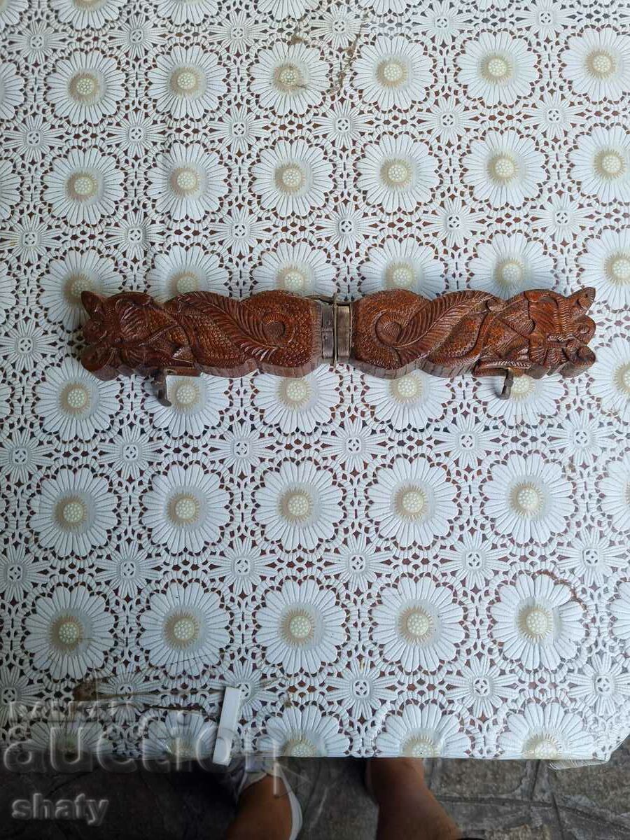 Old Indian knife and fork. Wood carving