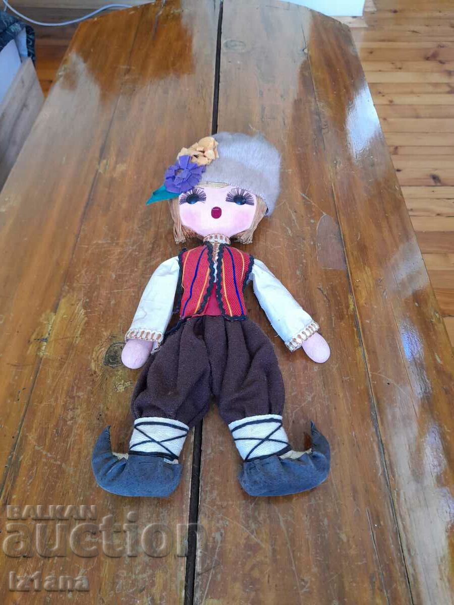 Old wall doll