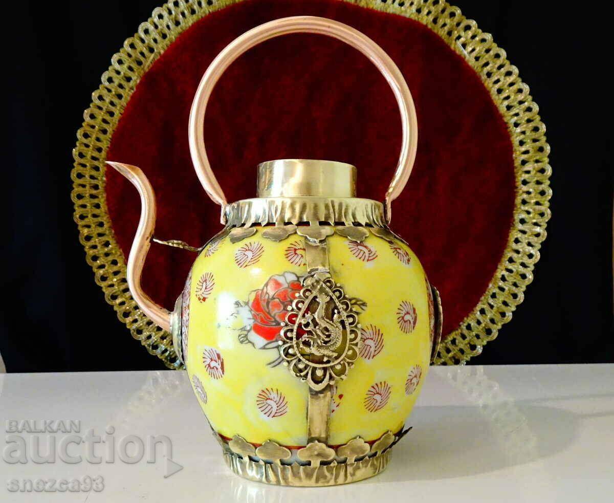 Tibetan teapot, jug made of porcelain, copper and brass.