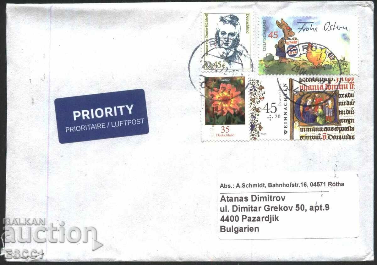 Traveled envelope with stamps Christmas 2009, Easter 2014 from Germany