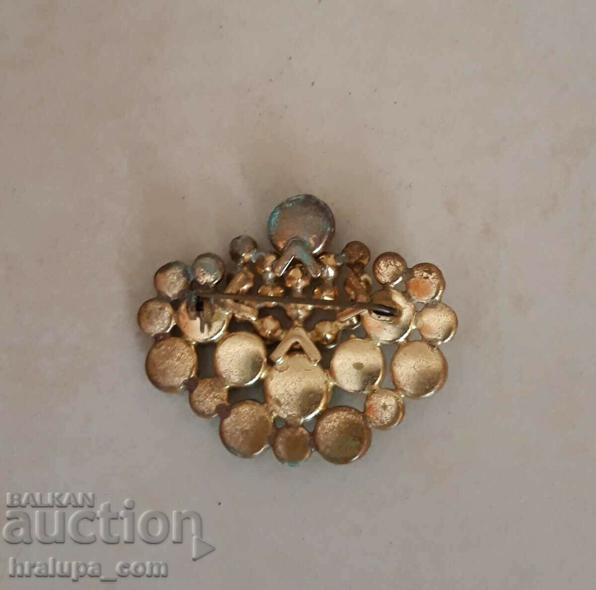 An old brooch with crystals with price 25.00 BGN | € 12.78 An old brooch with crystals with price 25.00 BGN | € 12.78