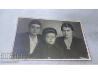 Photo Two young women and a boy
