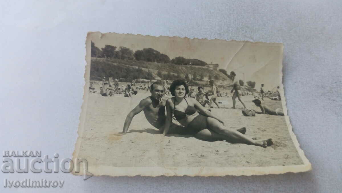 Fotografie Bărbat și femeie pe plajă