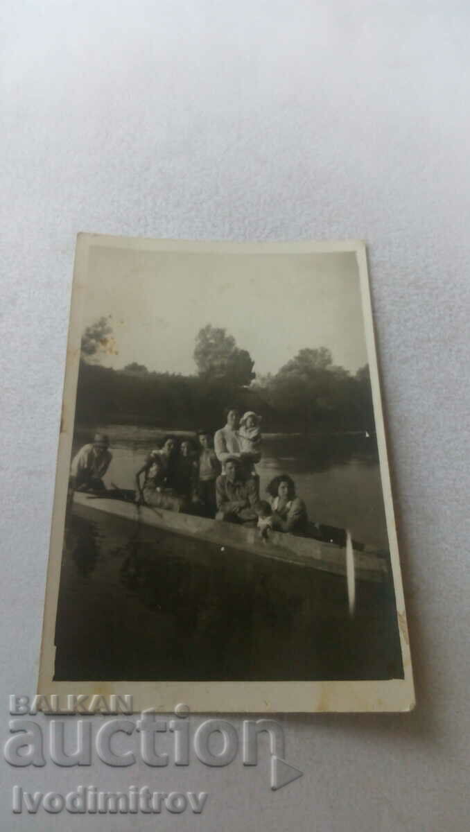 Photo Polish Trumpet Two men women and a baby in a boat