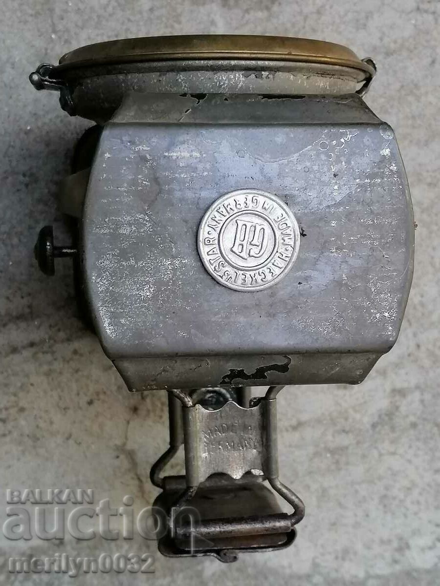 Delivery of Old German lantern headlight of a bicycle lamp from a wheel Delivery of Old German lantern headlight of a bicycle lamp from a wheel