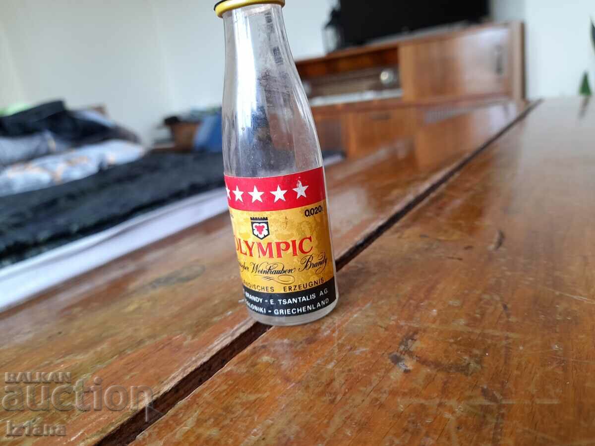 Аукцион Стара бутилка от ракия Olympic Аукцион Стара бутилка от ракия Olympic