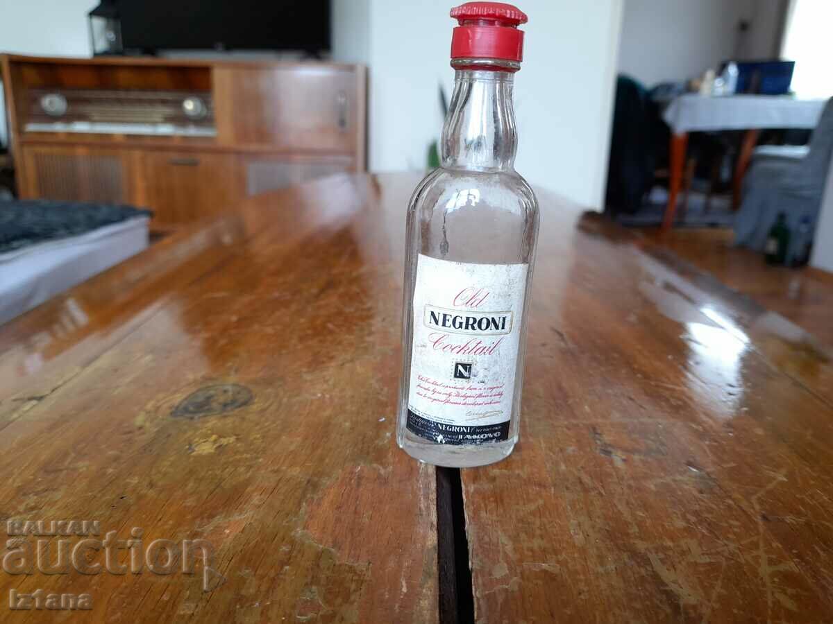 Old bottle of Negroni cocktail