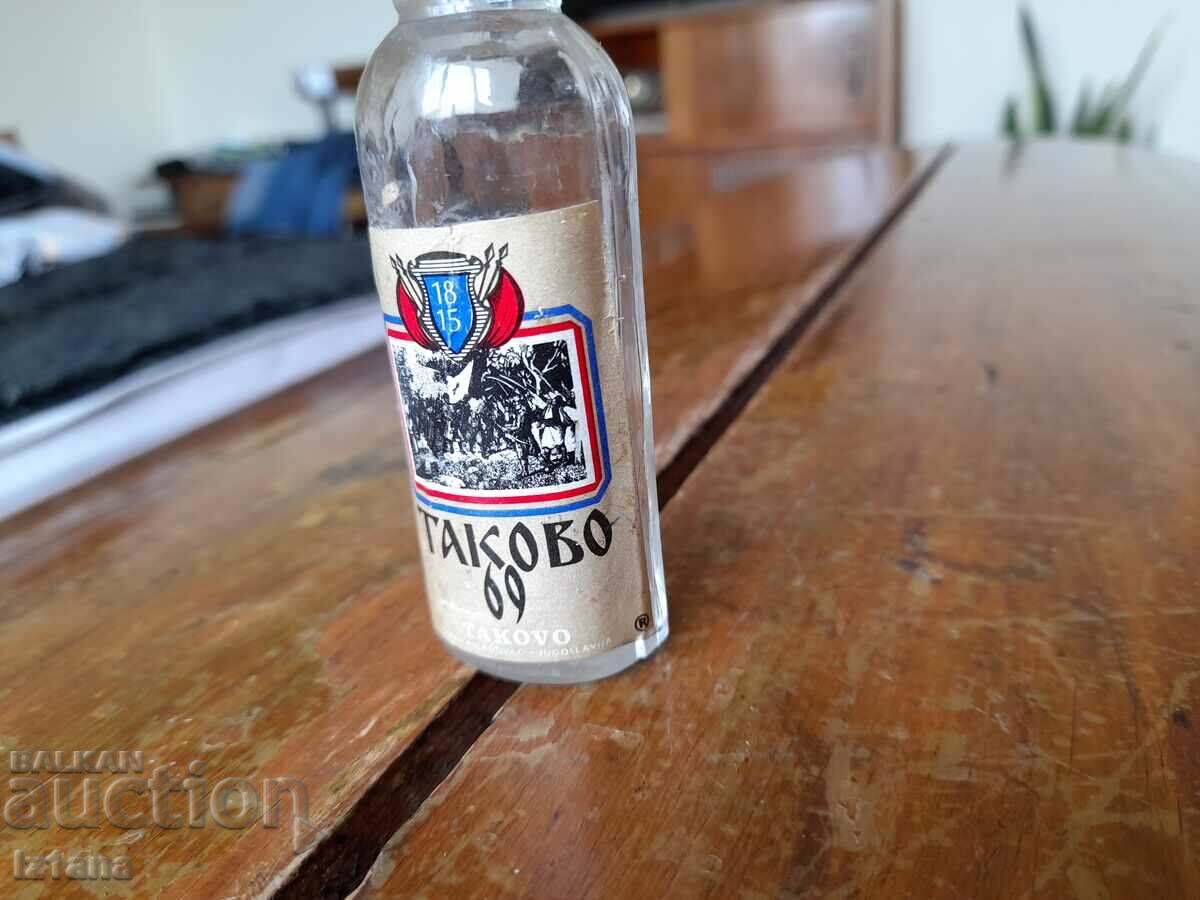 Auction  Old bottle of Takovo 69