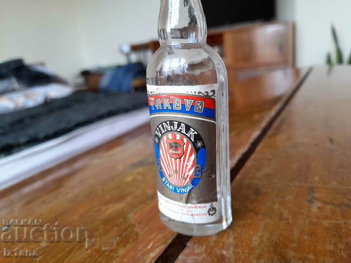 Auction Old bottle of Takovo cognac Auction Old bottle of Takovo cognac