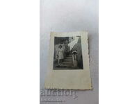 Picture Two women and a boy on stairs