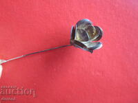 A great silver rose