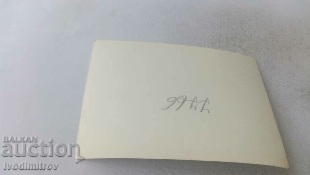 Photo Man in shorts on rocks in the forest with price 2.35 BGN | € 1.20