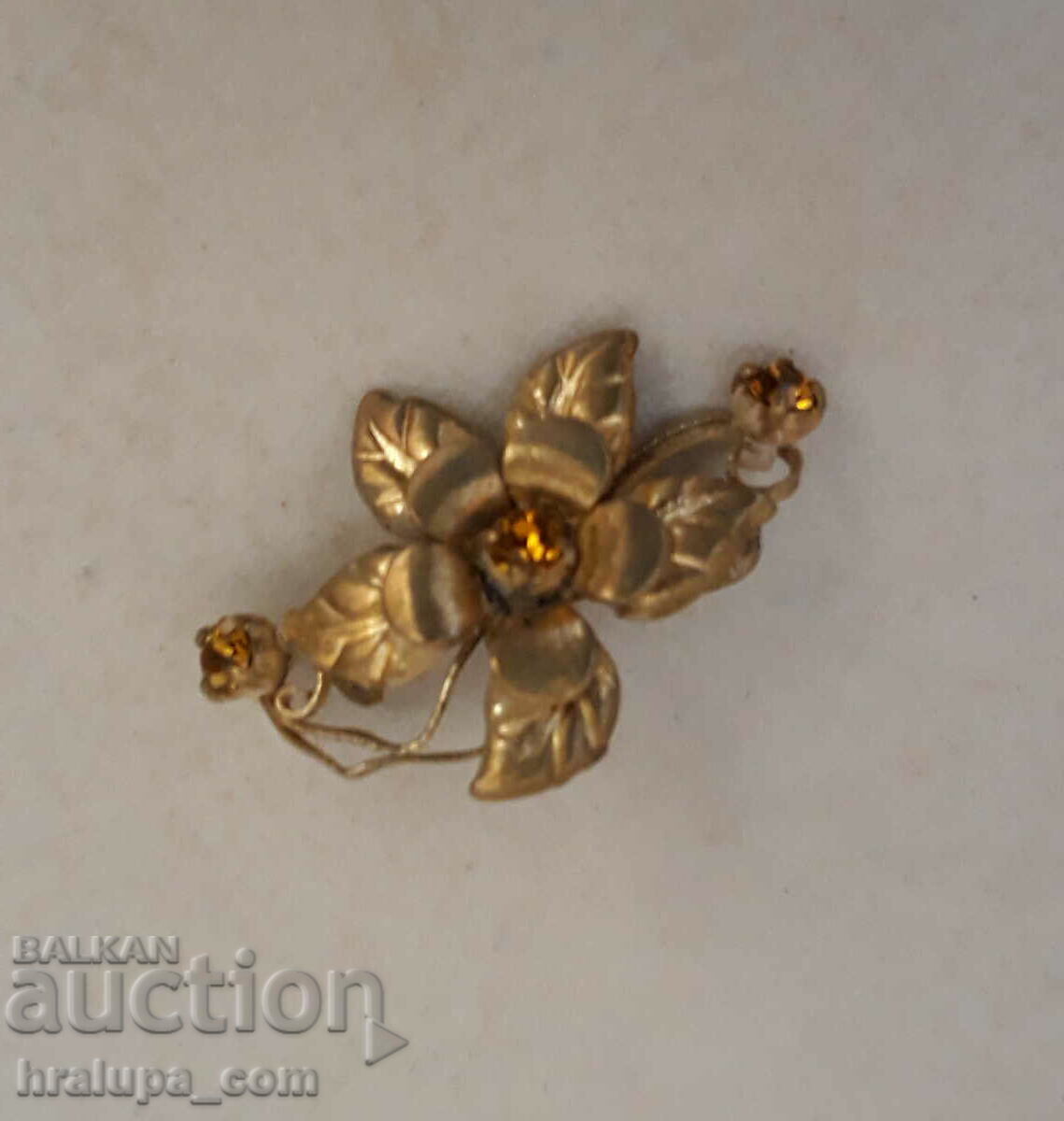 Old flower brooch with crystals