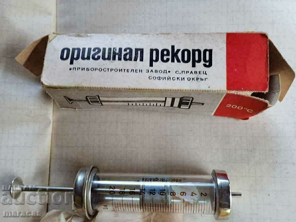 Old glass syringe