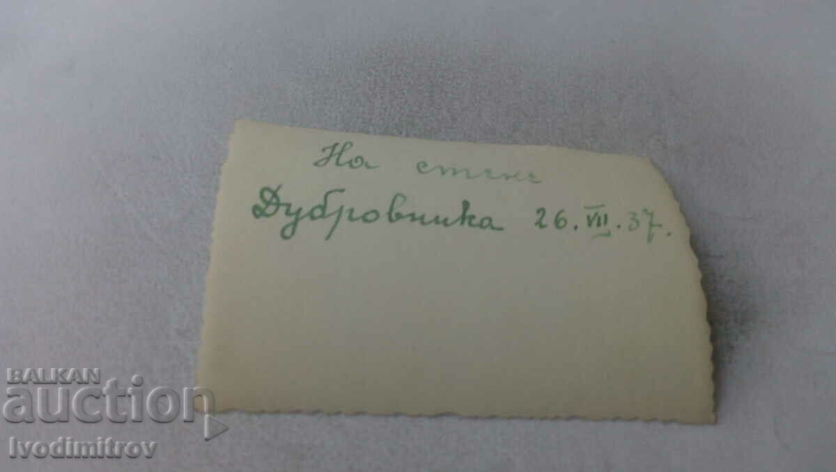 Photo Dubrovnik Man and woman on a fortress wall 1937 with price 1.75 BGN | € 0.89