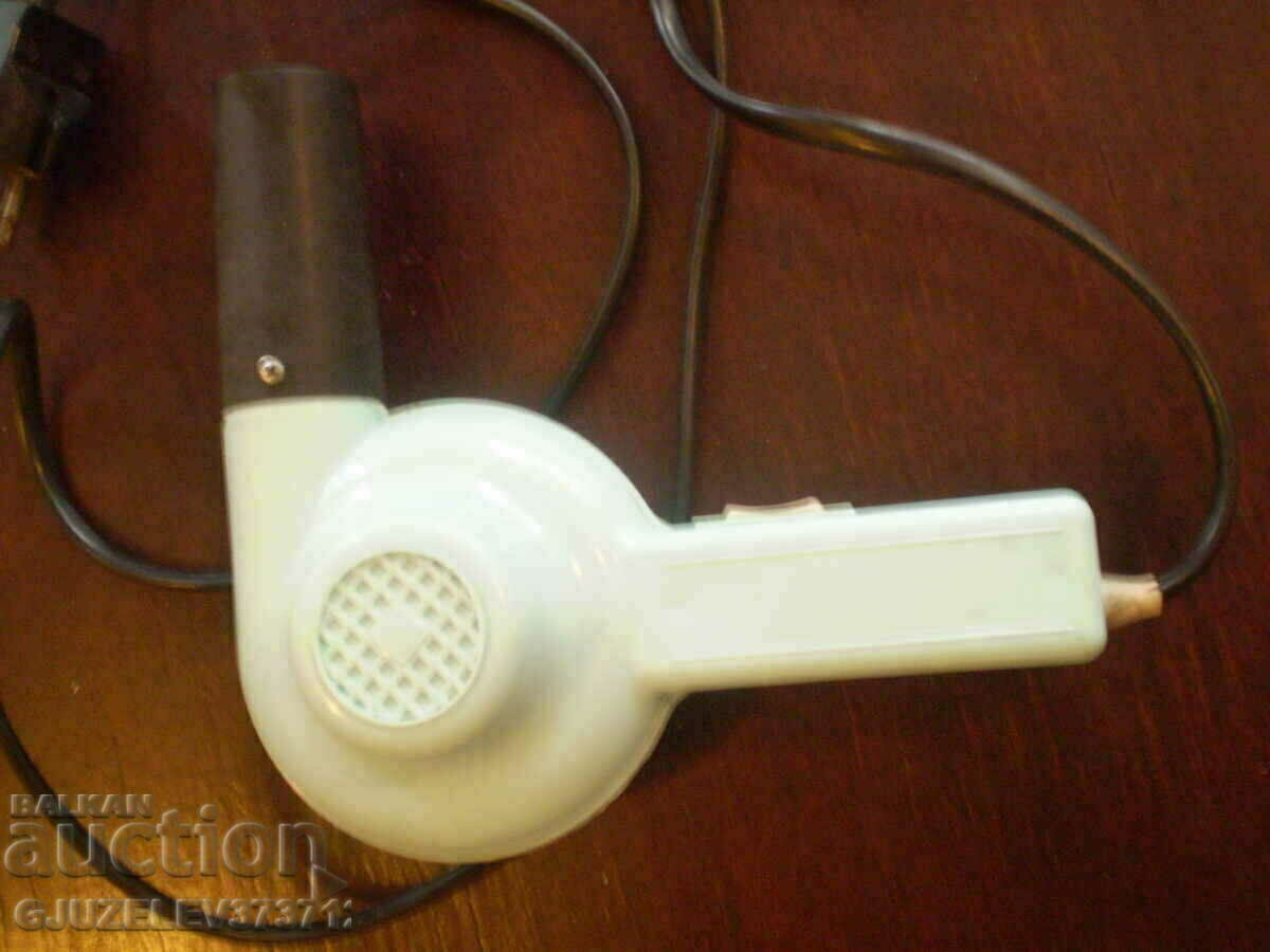 Delivery of retro hair dryer with 2 power levels. is in working order and working
