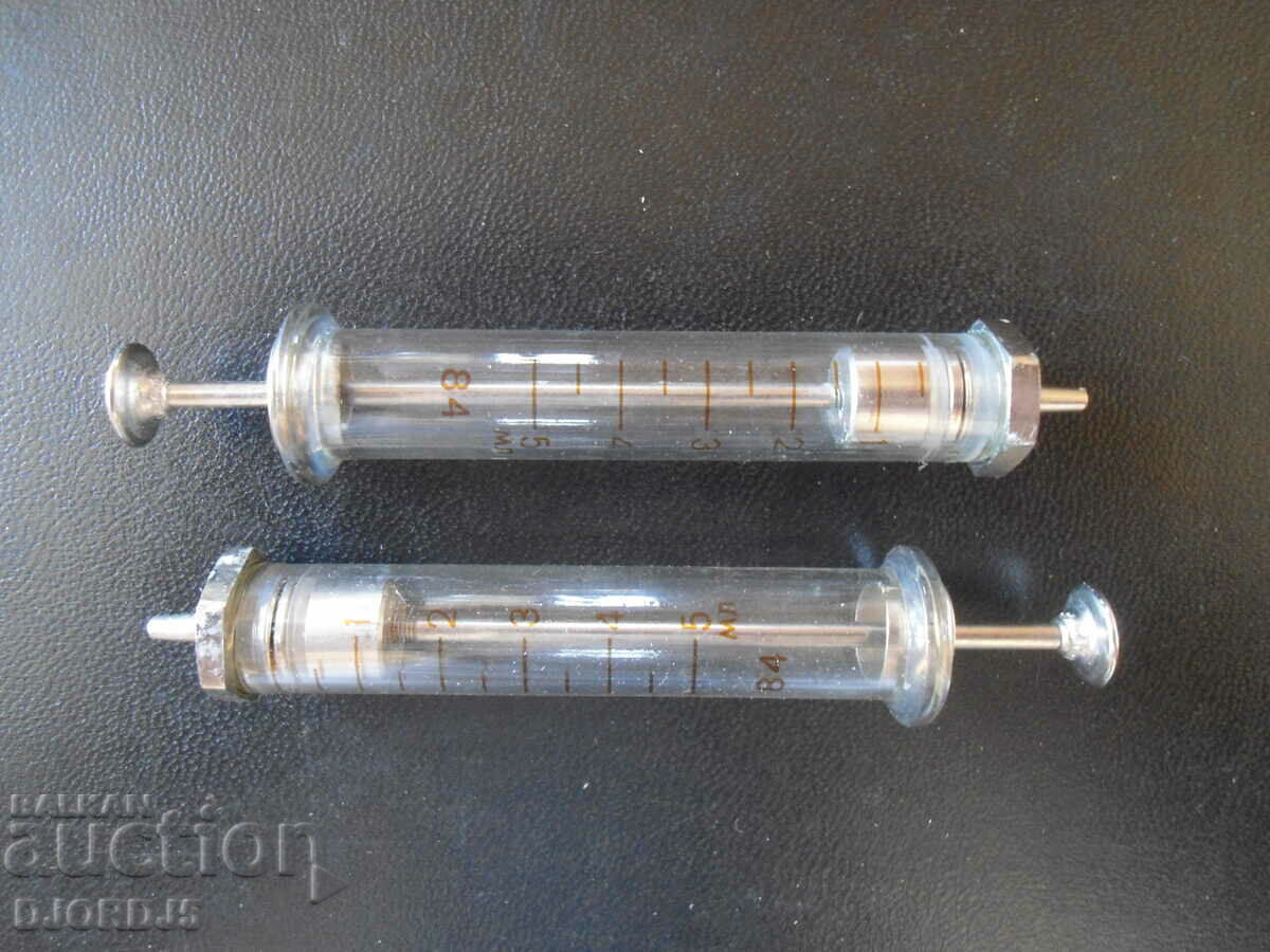 Old glass syringes, 2 pieces with price 8.00 BGN | € 4.09