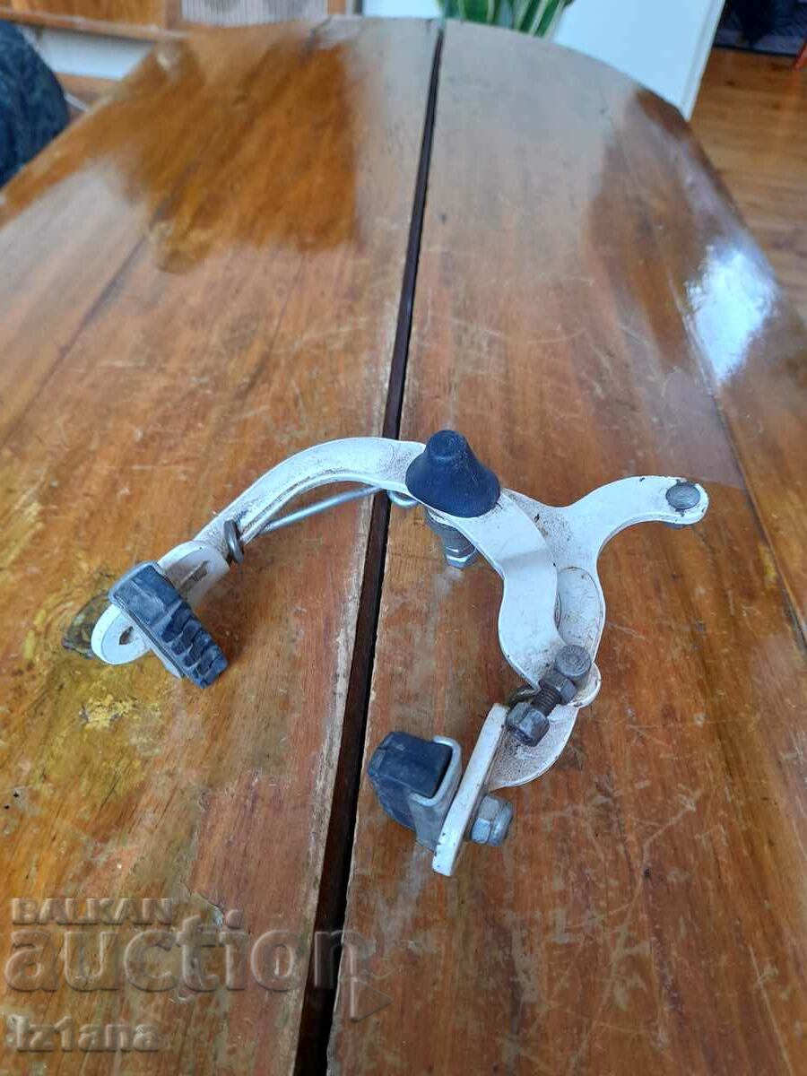 Old brake calipers for a bicycle, wheel