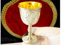 Silver-plated cup with gilding, embossed vines.