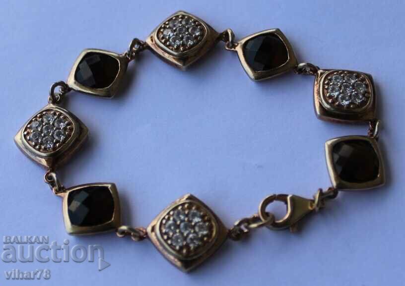 Silver branded bracelet with gold plated 0.4 micron rauchtop stones