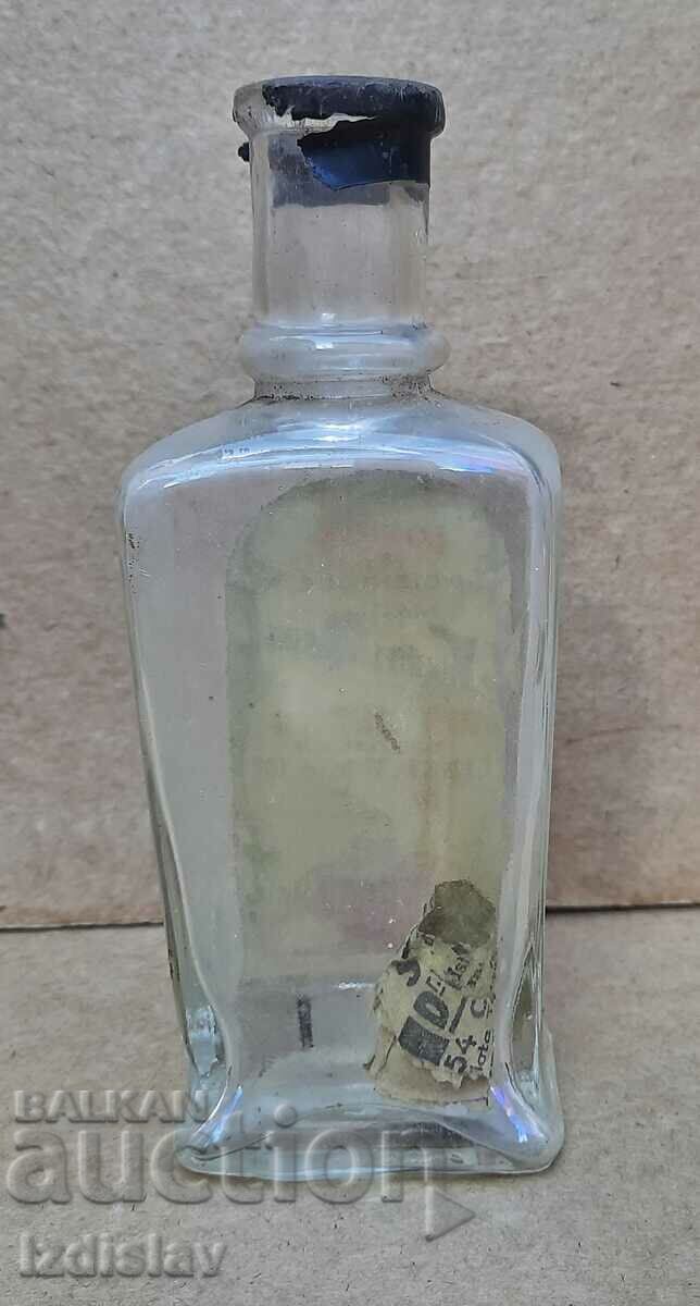 Licitație Sticla veche de sticla cu eticheta originala