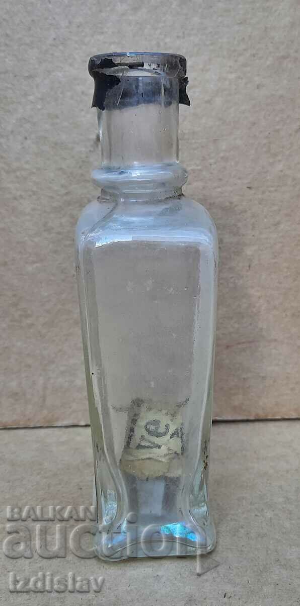 Livrarea Sticla veche de sticla cu eticheta originala