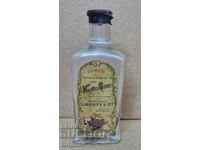 Старо стъклено шише с оригинален етикет