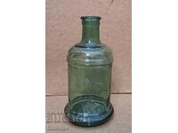 Antique glass bottle part of a collection