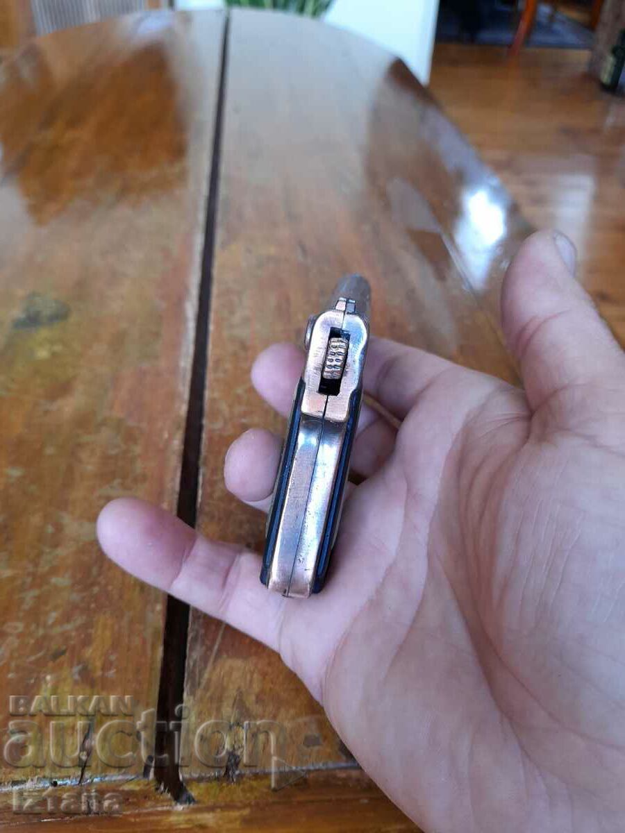Auction Old pistol lighter, souvenir Auction Old pistol lighter, souvenir