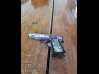 Old pistol lighter, souvenir