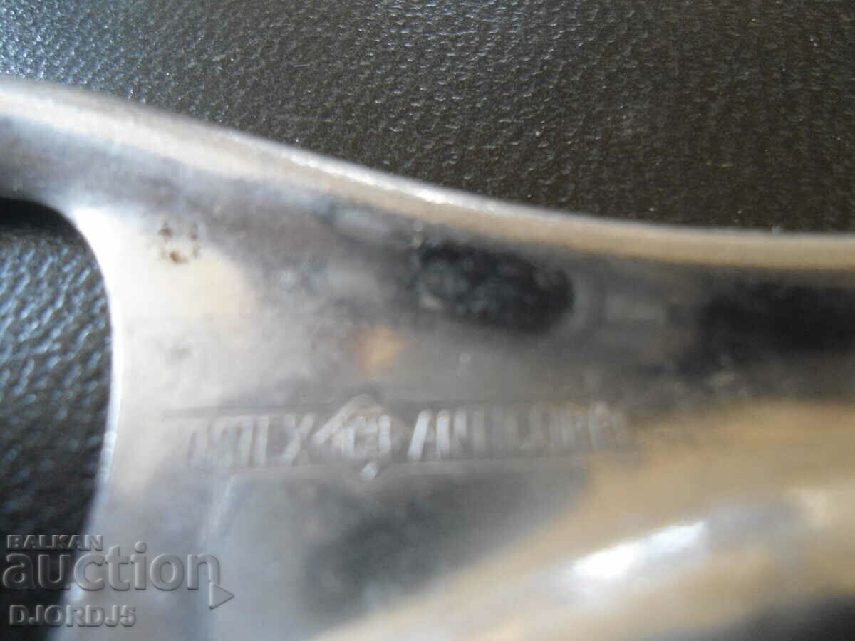 Auction Old metal bottle opener, marking Auction Old metal bottle opener, marking