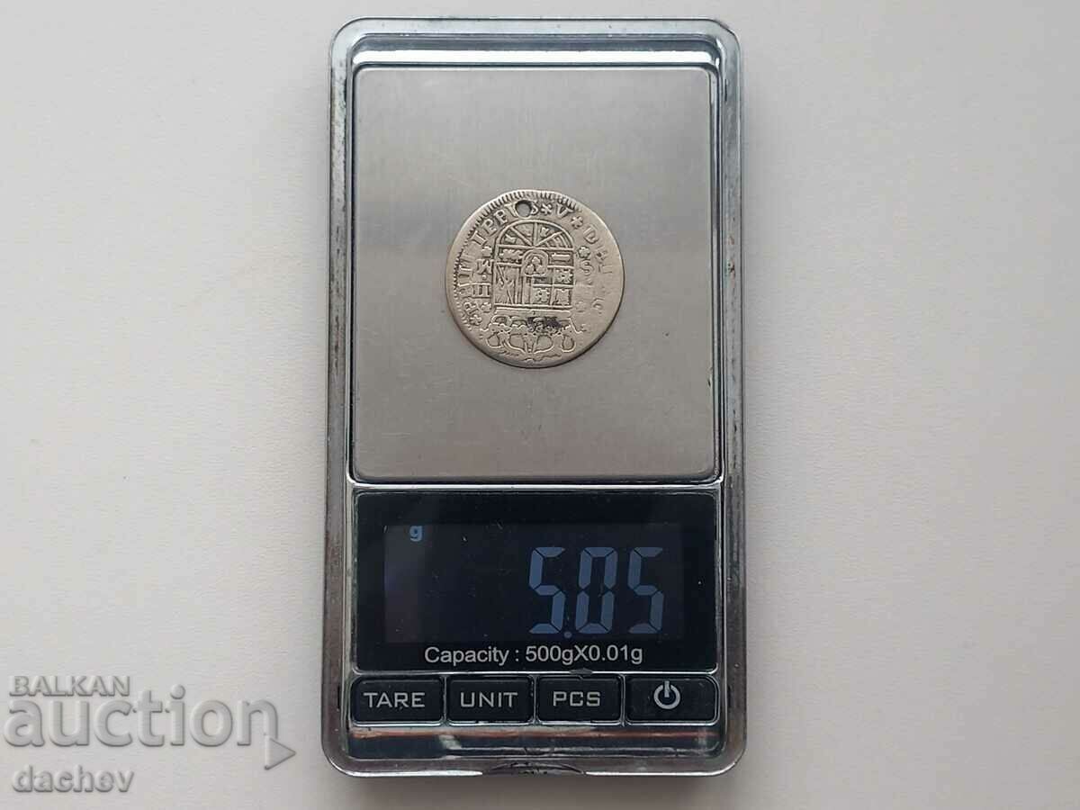 Livrarea Monedă rară de argint Reala Spania Argint din bijuterii 1718. Livrarea Monedă rară de argint Reala Spania Argint din bijuterii 1718.