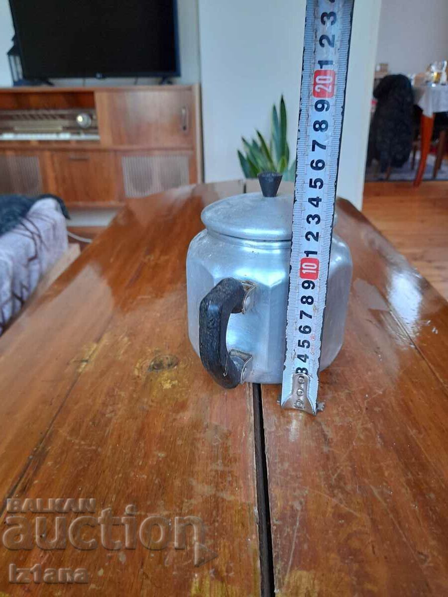 Delivery of Old aluminum teapot Delivery of Old aluminum teapot