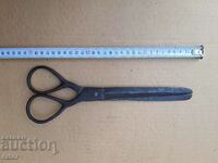A very large, very old pair of scissors