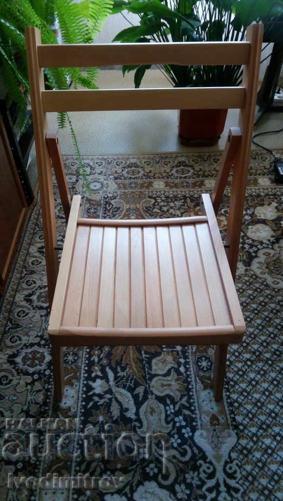 Folding chair made of solid walnut wood