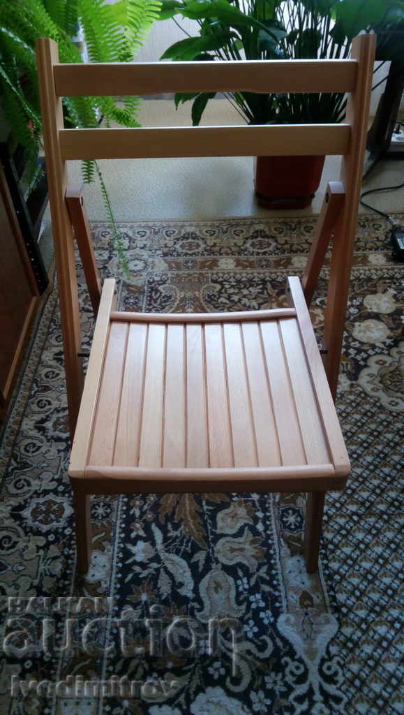 Folding chair made of solid walnut wood Folding chair made of solid walnut wood