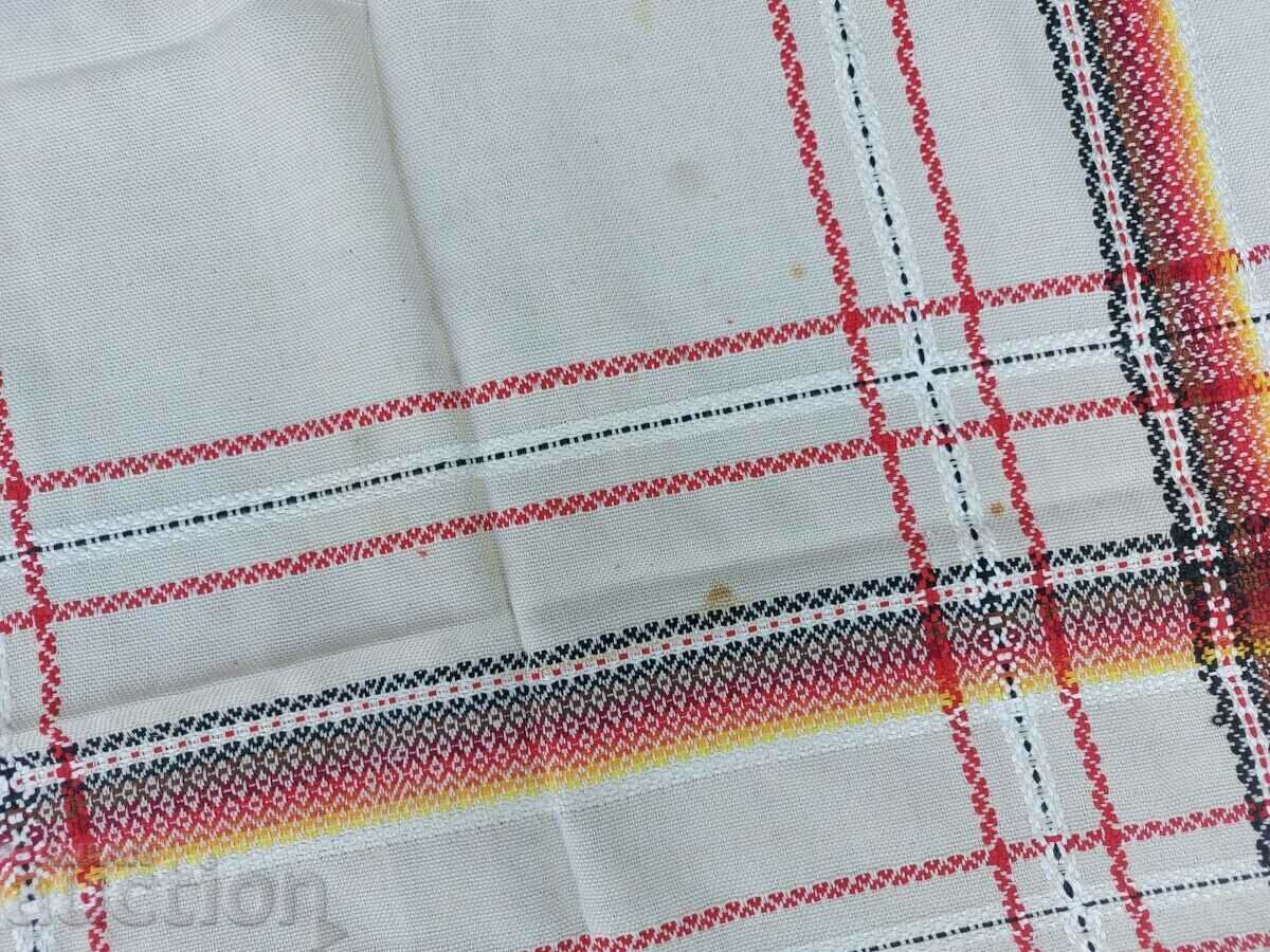 Delivery of AN OLD ETHNIC CHECKED HOUSEHOLD ROOF HAS SPOTS