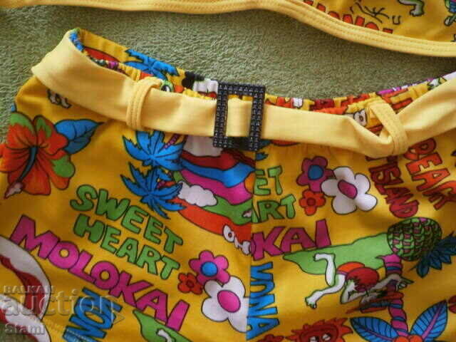 Children's swimsuit in yellow for a 7-8 year old child with price 6.00 BGN | € 3.07 Children's swimsuit in yellow for a 7-8 year old child with price 6.00 BGN | € 3.07