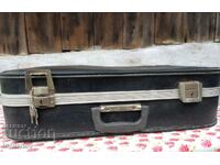 Suitcase with children's musical instruments